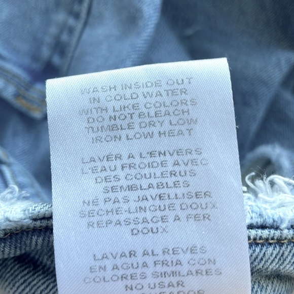 Good American Good Boy Twisted  Slit Ankle Jeans. High Rise. Button fly. Size 15 - Picture 15 of 16